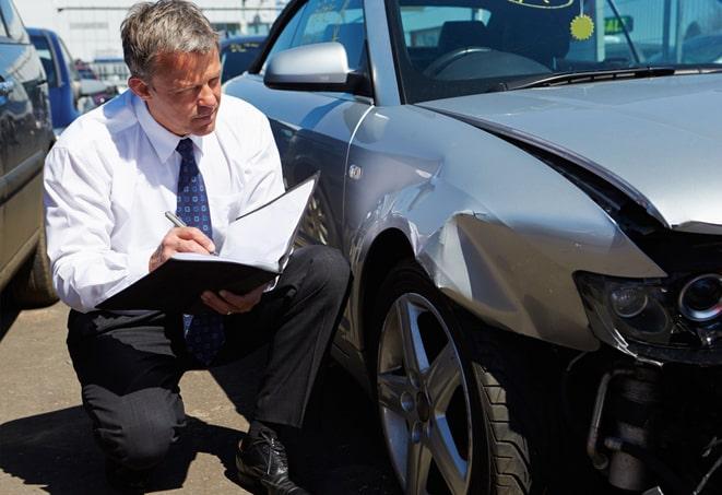 auto insurance agent and customer in discussion